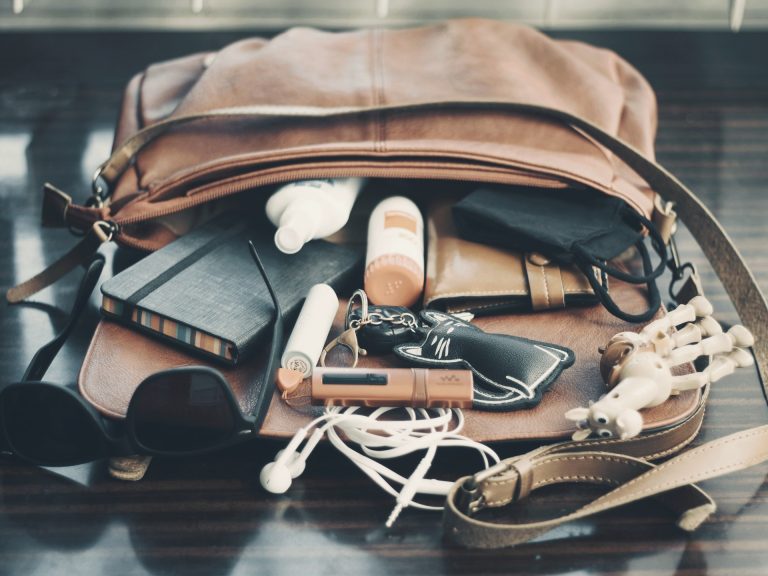 Travel handbag contain lightweight material, multiple compartments