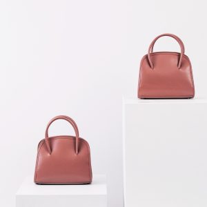 Small micro handbag styled as a fashion accessory"