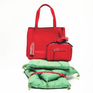 "Bright colored handbag as a statement accessory"
