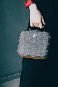 "Designer logo handbag on display"