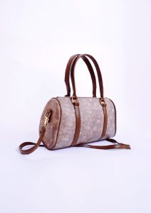Vintage-style unique handbag with worn leather detailing